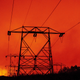 High-tension power lines are seen against a burning landscape during the Creek Fire in Fresno County, California.